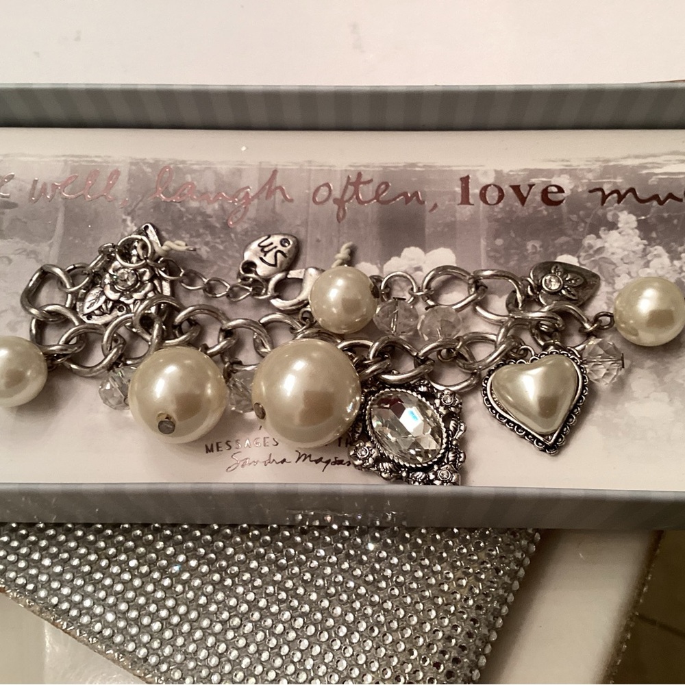 Elegant Silver and Pearl Charm Bracelet